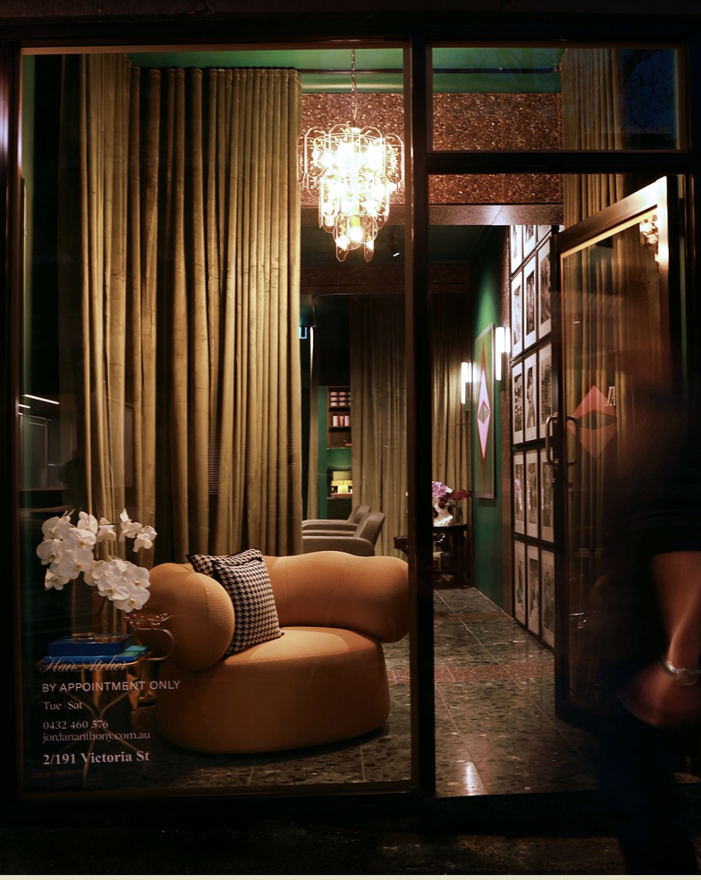 JA Hair Salon Potts Point — Victoria Street shopfront at night